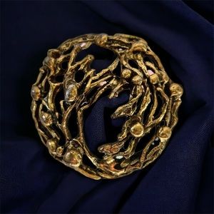 Vintage Robert Zentall circular abstract brooch